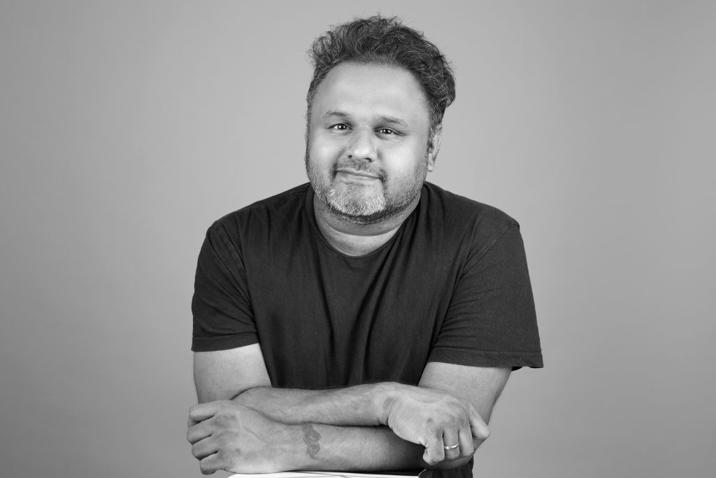 Black and white portrait of Yadu Rajiv